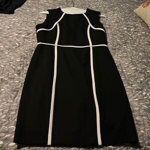 New Calvin Klein classic black and white dress. No tags but never worn. Size 8P.